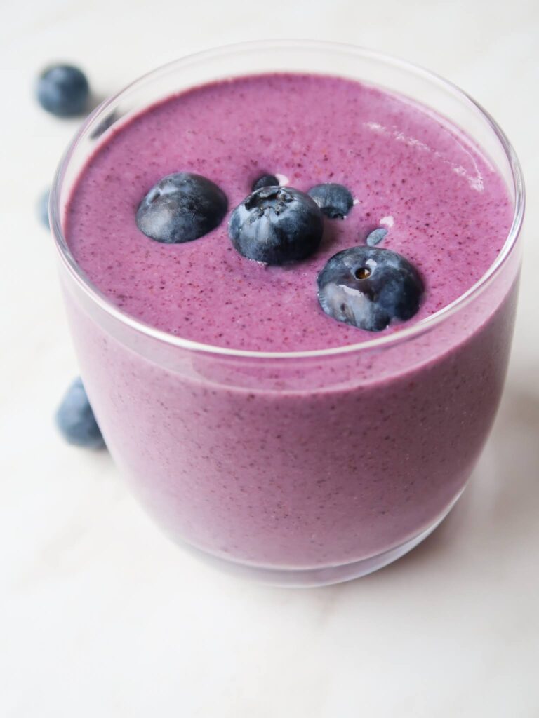 This is the best blueberry smoothie made with 3 healthy ingredients: blueberries, banana and some cashews. This vegan blueberry banana smoothie is gluten free, dairy free and paleo.